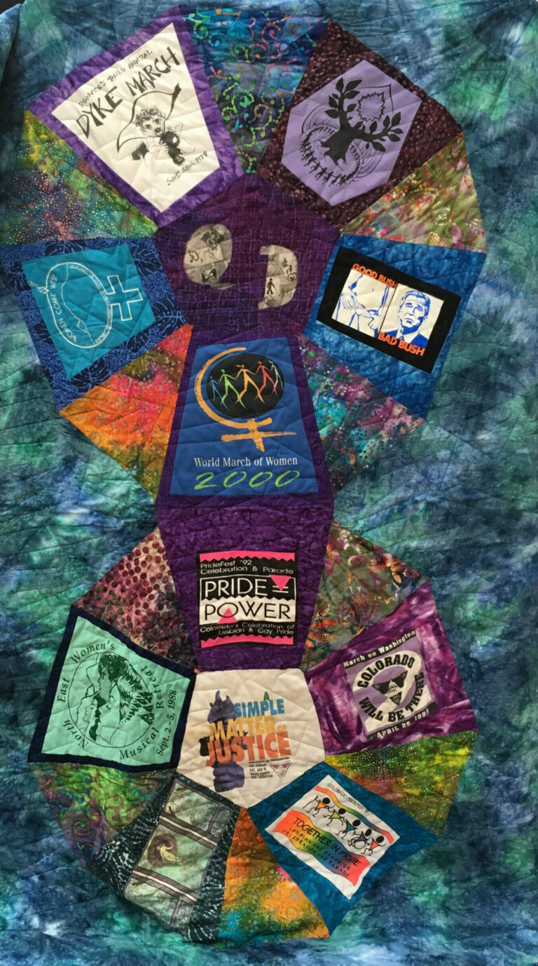 Quilt made from t-shirts related to women and LGBTI+ issues.